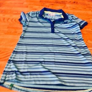 New Balance woman’s  Polo with light Blue and navy Stripes